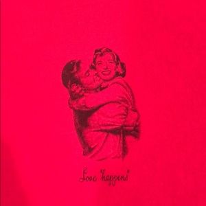 Love Happens graphic t-shirt